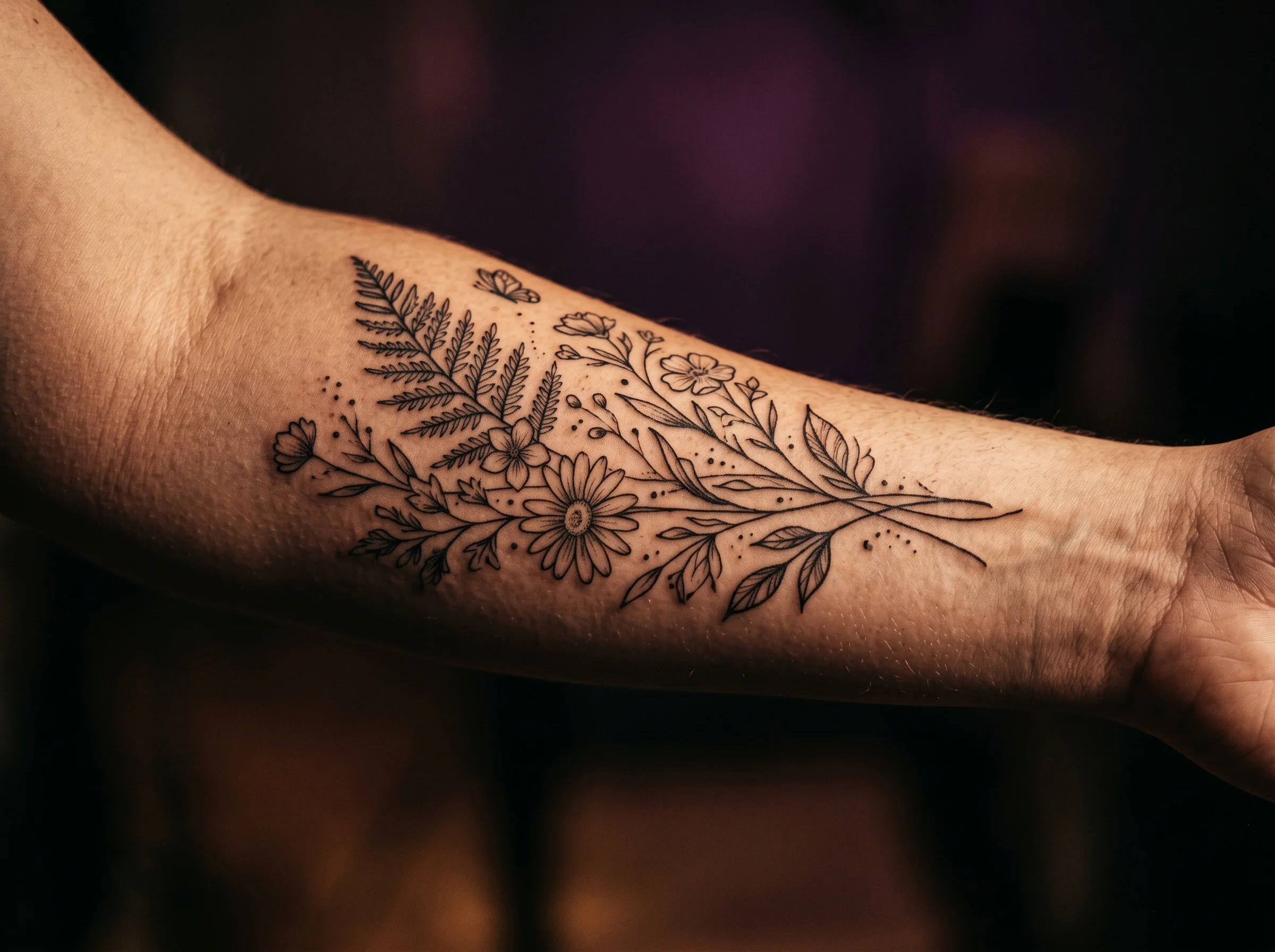 Macro detail of a tattoo design rendered onto skin with natural shadow and contour
